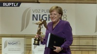 Merkel mit Goldene